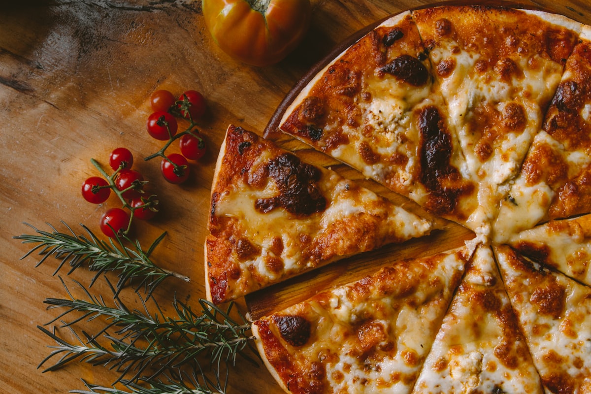 Signature cheese-pull pizzas